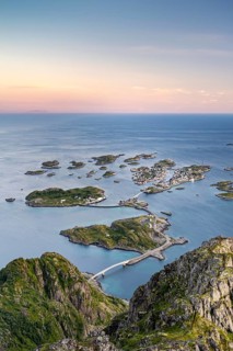 View of fishing village Henningsvaer from the top of Festvagtinden