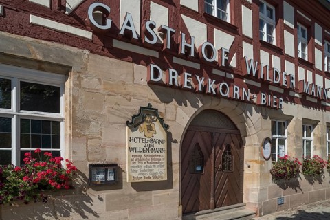Entrance gate to the historic Wilder Mann Inn since 1414