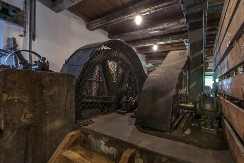 Wheels of a grain mill driven by water power