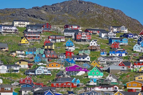 Colourful wooden houses on a mountainside
