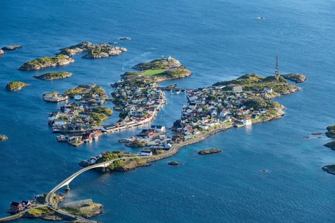 View of fishing village Henningsvaer from the top of Festvagtinden