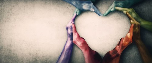 Different people unite for common purpose as diverse person hands colored in the lgbtq pride colors
