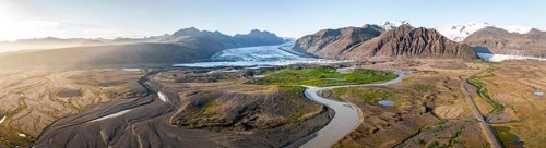 Glacier river in front of Mountains