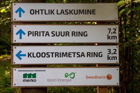 Hiking signpost in the forest along the Pirita River