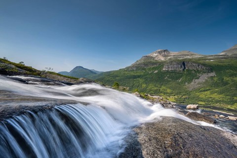 Waterfall flowing in Innerdalen High Valley