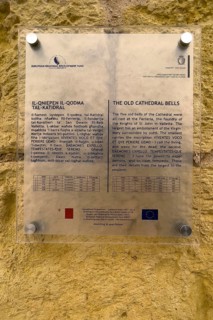 Tourist Information Board on Old Bells of St Marija Cathedral in Gozo Citadel