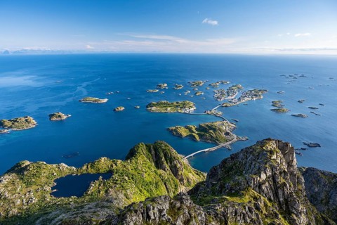 View of fishing village Henningsvaer from the top of Festvagtinden