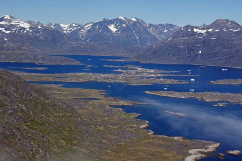 Icebergs and ice in a fjord