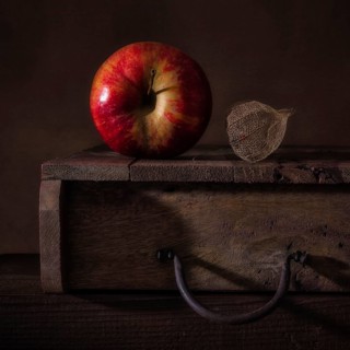 Still Life with Apple on Old Wooden Crate