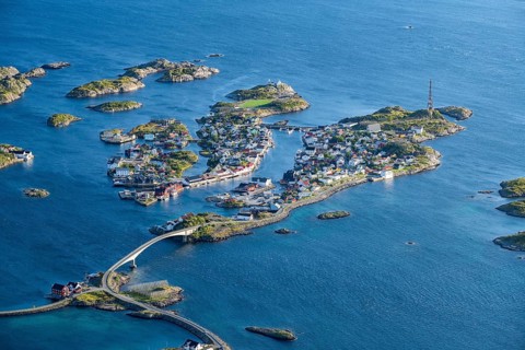 View of fishing village Henningsvaer from the top of Festvagtinden