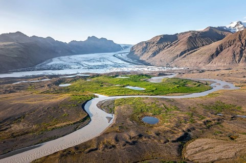 Glacier river in front of Mountains