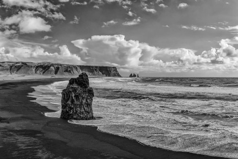 At Kirkjufjara beach at Cape Dyrholaey