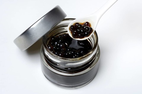 Aceto pearls in glass and spoon
