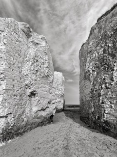 Chalk cliffs with passage to the sea