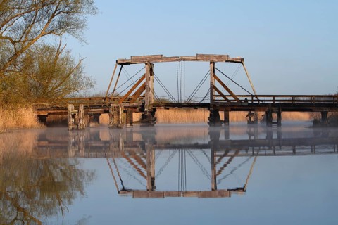 Historic wooden drawbridge over the Trebel near Nehringen