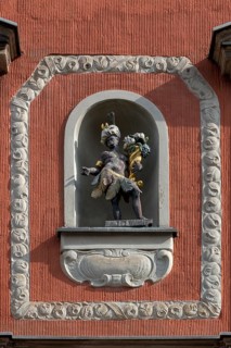 Sculpture with cornucopia in a niche on the facade of the Mohrenapotheke since 1890