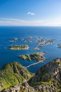 View of fishing village Henningsvaer from the top of Festvagtinden
