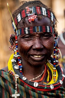 Scar face as a mark of beauty woman from the Jiye tribe