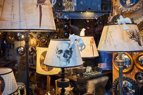 Shop window with lamps and decorative items in Marais