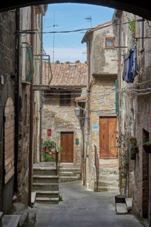 Picturesque alley with steps leading to the entrances