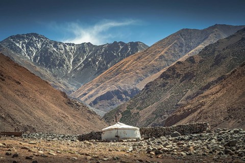 Mongolian nomadic Ger family near the mountain Ikh Bogd. Bayanhongor Province