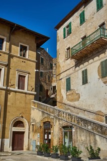 Piazza G. Garibaldi with the Teatro Salvini and stairway to the old town