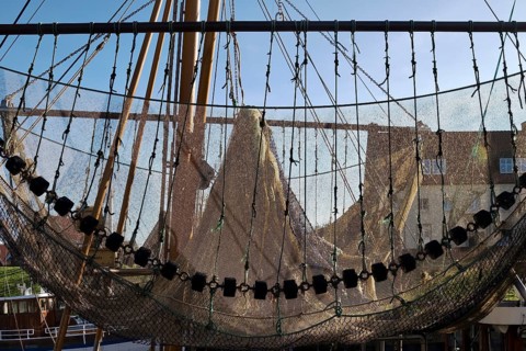 Fishing net from a crab cutter in the fishing harbour