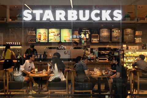 Starbucks shop window illuminated