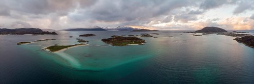 View over the sea with fish farms to Baltsfjorden and the mountains of Balten