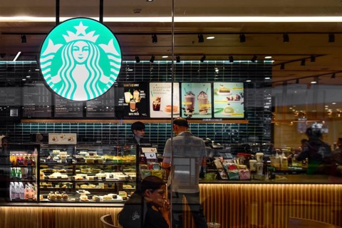 Starbucks shop window illuminated