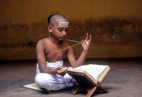 Indian boy reciting vedas
