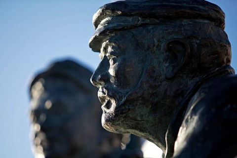 Bronze statues of dolphin spitters Joke Rinne and Hinnerk de Vries at the Ratsdelft