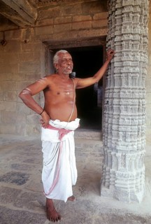Temple priest standing Kampaheswarar temple in Thirubuvanam near Kumbakonam