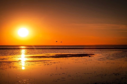 Sunset at the beautiful Buun Tsagaan Lake. Bayanhongor Province