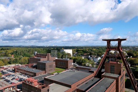 View from the roof terrace of the visitor centre onto the grounds of the Zollverein Coal Mine Industrial Complex with the winding tower
