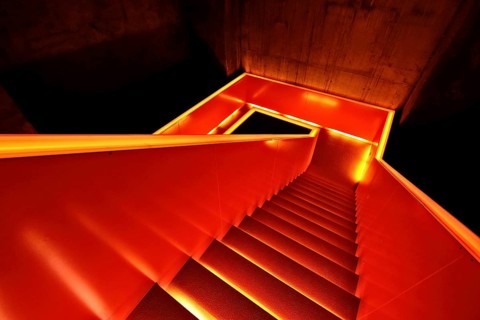 Illuminated staircase in the Ruhr Museum at Zeche Zollverein