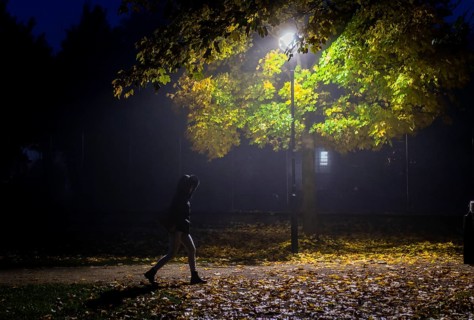 A woman walks through a lonely park in Markt Swabia
