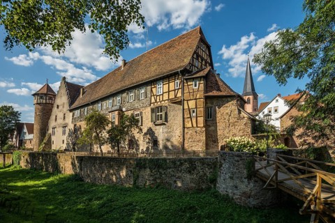 City wall with thief tower and castle