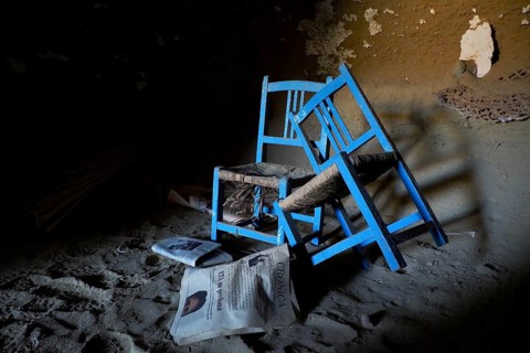 Two blue chairs with wickerwork in cave