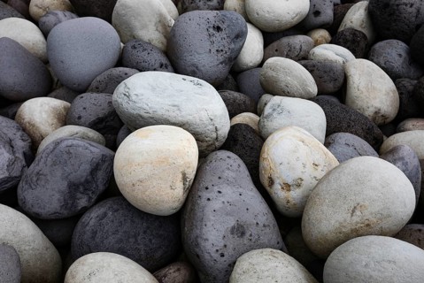 Large round stones on the coast of Rocha da Relva