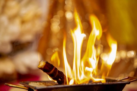 Close up of the offerings of Yajna at a Hindu wedding in Beau-Bassin