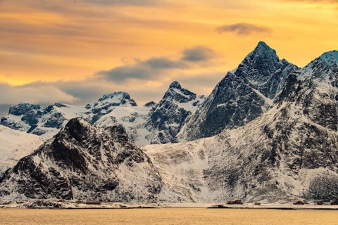 Evening glow in wintry Scandinavian landscape