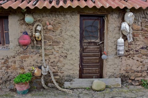 Ropes and buoys as decoration on the wall of a fisherman's house