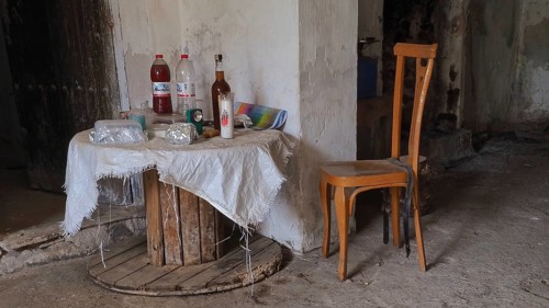 Abandoned finca as working room with chairs and wardrobe