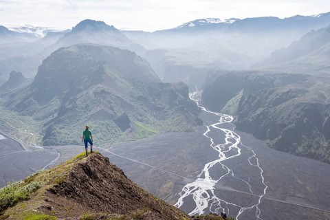 Hiker looking over landscape