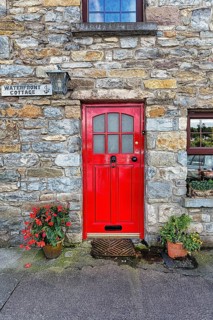 Red door in a stone house