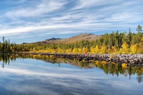 Reflection of an autumnal fell landscape