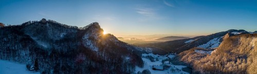 Sunrise at the Frohburg castle ruins and Geissflue summit cross