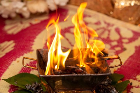 Close up of the offerings of Yajna at a Hindu wedding in Beau-Bassin