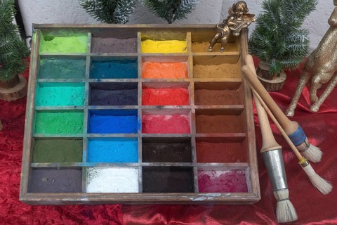 Old wooden box with powder paints